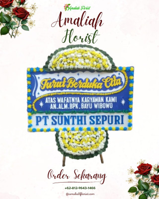 Papan Bunga Duka di Tanah Baru